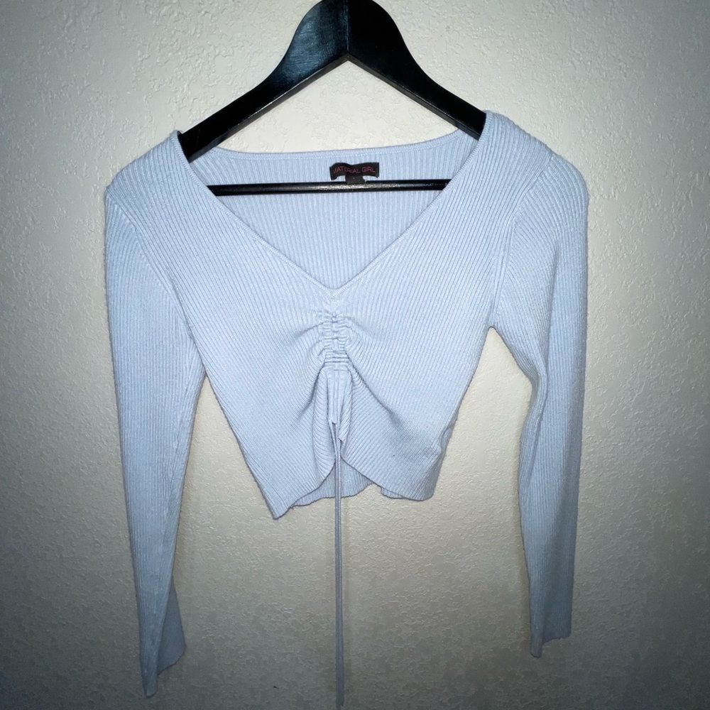 - light blue shirt - long sleeve - cropped - scrunch in the middle in the front